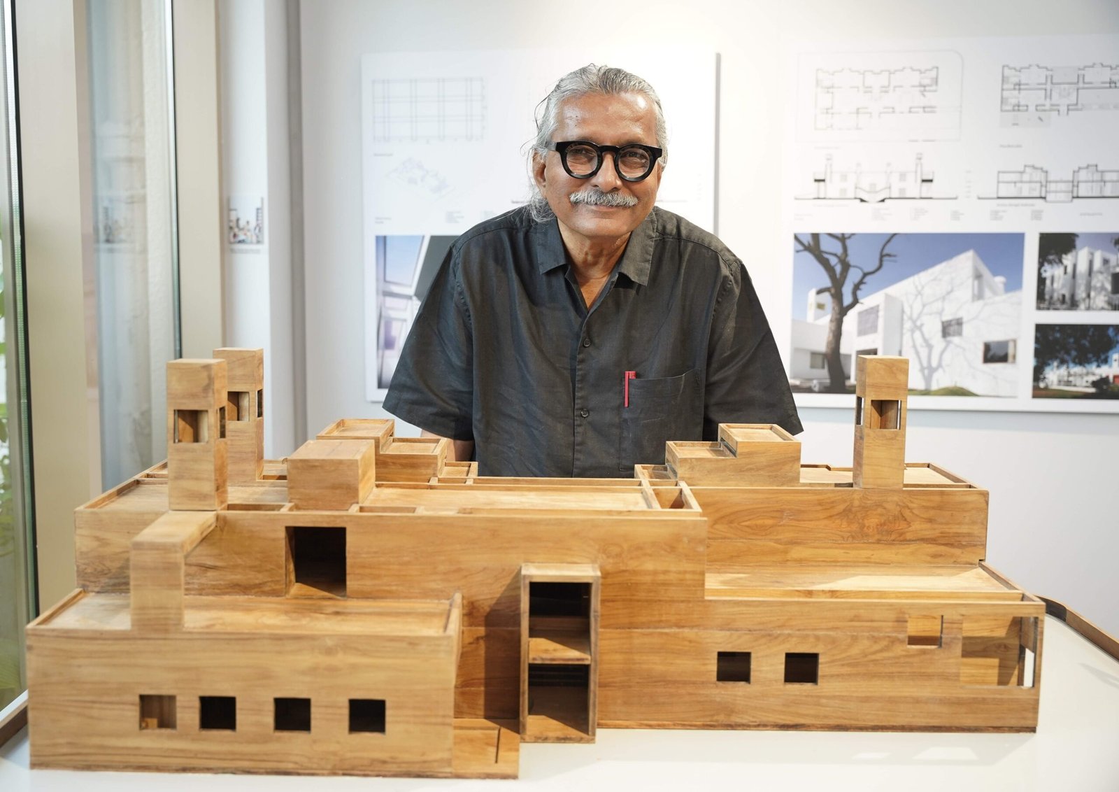 Ar. Girish Doshi with a miniature of one of his works at the 2nd edition of B.V Doshi Memorial Exhibition
